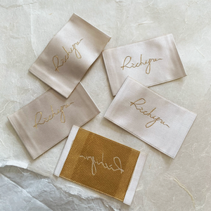 High-end simple and delicate satin fabric logo custom-made three-dimensional weaving method <strong>midline</strong> gold-lettered high-end cloth - Product Image 3