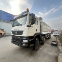 Camion benne Sinotruk HOWO TX 8x4 reconditionné fiable avec moteur MAN, d'occasion, pour l'exploitation minière intensive