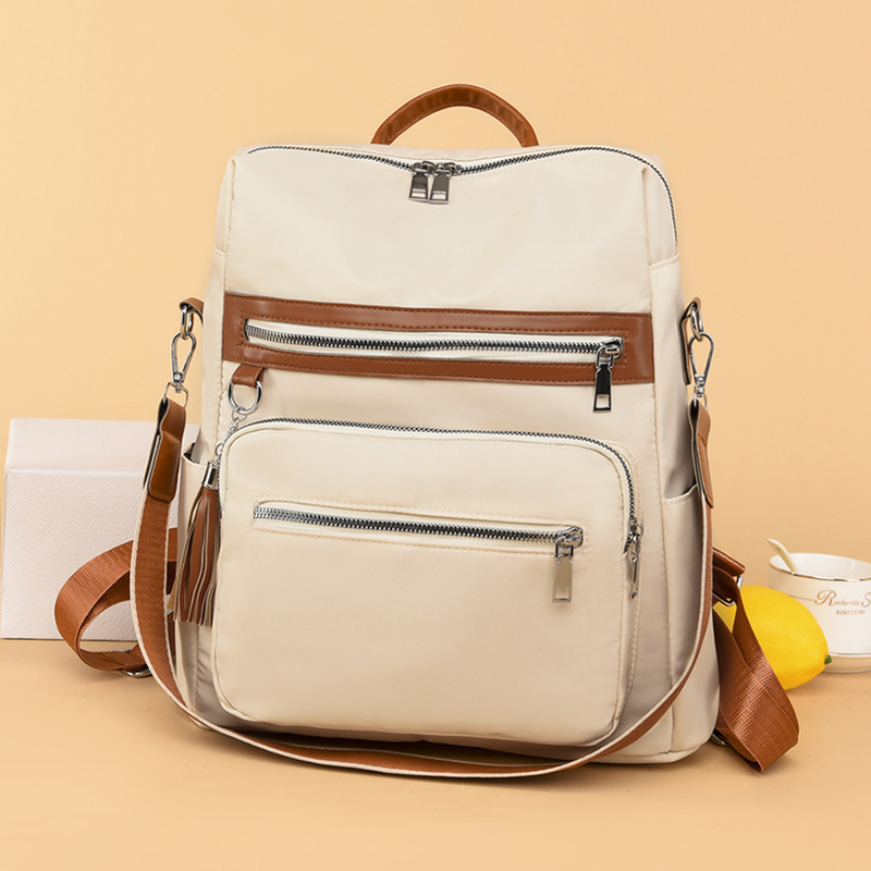 Женские модные оксфордовые рюкзаки водонепроницаемые противоугонные дорожные сумки через плечо с кисточкой