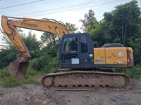 Excavatrice sur chenilles d'occasion Hyundai R225LC-7, poids opérationnel 22100 kg, équipement de construction avec moteur et propulseur