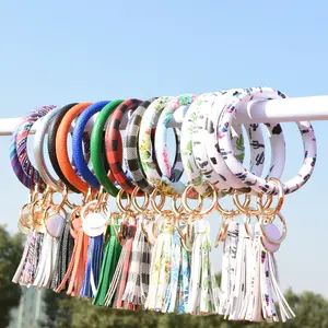 מפעל סיטונאי ראשי תיבות Wristlet ציצית צמיד Keychain אישית אמייל דיסק עור עגול ציצית Keychain