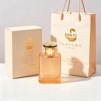 Flacon de parfum en verre ambré pêche 50ml 1.7oz texture craquelée avec col doré et capuchon noir et or, vente en gros et approvisionnement en vrac