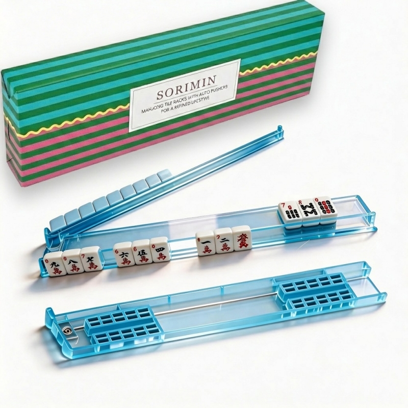 กล่องของขวัญลายทางสีเขียวและชมพู พร้อมไม้บรรทัดกดสีน้ำเงิน