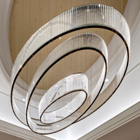 Lustre circulaire en cristal personnalisable pour hôtels salles de banquets bijouterie table de sable projets de villa éclairage de plafond