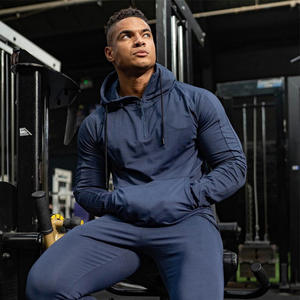 เสื้อฮู้ดดี้ออกกำลังกายผู้ชายทรงสลิมฟิต พิมพ์ลายโลโก้ตามสั่ง ผ้าฝ้าย 100% ระบายอากาศได้ดี ให้ความอบอุ่น เหมาะสำหรับฤดูใบไม้ร่วง ออกแบบสำหรับเล่นกีฬาและฟิตเนส พิมพ์ลายสกรีน - Product Image 1