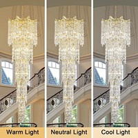 Lustre LED moderne en acier et cristal en forme d'anneau, suspension longue et luxueuse pour hall d'hôtel, projet de décoration d'escalier