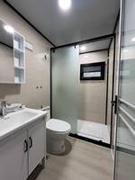 Maisonnette préfabriquée moderne de luxe en conteneur d'acier extensible, étanche, résistante au feu, avec terrasse, porte vitrée, chambre et appartement, facile à assembler
