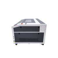 Machine de découpe laser 1060 Ruida CO2 pour la découpe par lots de textiles et d'appliques vestimentaires