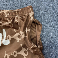 Short de sport imprimé par sublimation personnalisé en gros Short de basket-ball en maille de polyester respirant pour hommes