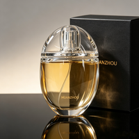 Flacon de parfum unique en forme d'œuf transparent de 100 ml, flacon pulvérisateur portable, flacon cosmétique de voyage avec boîte d'emballage