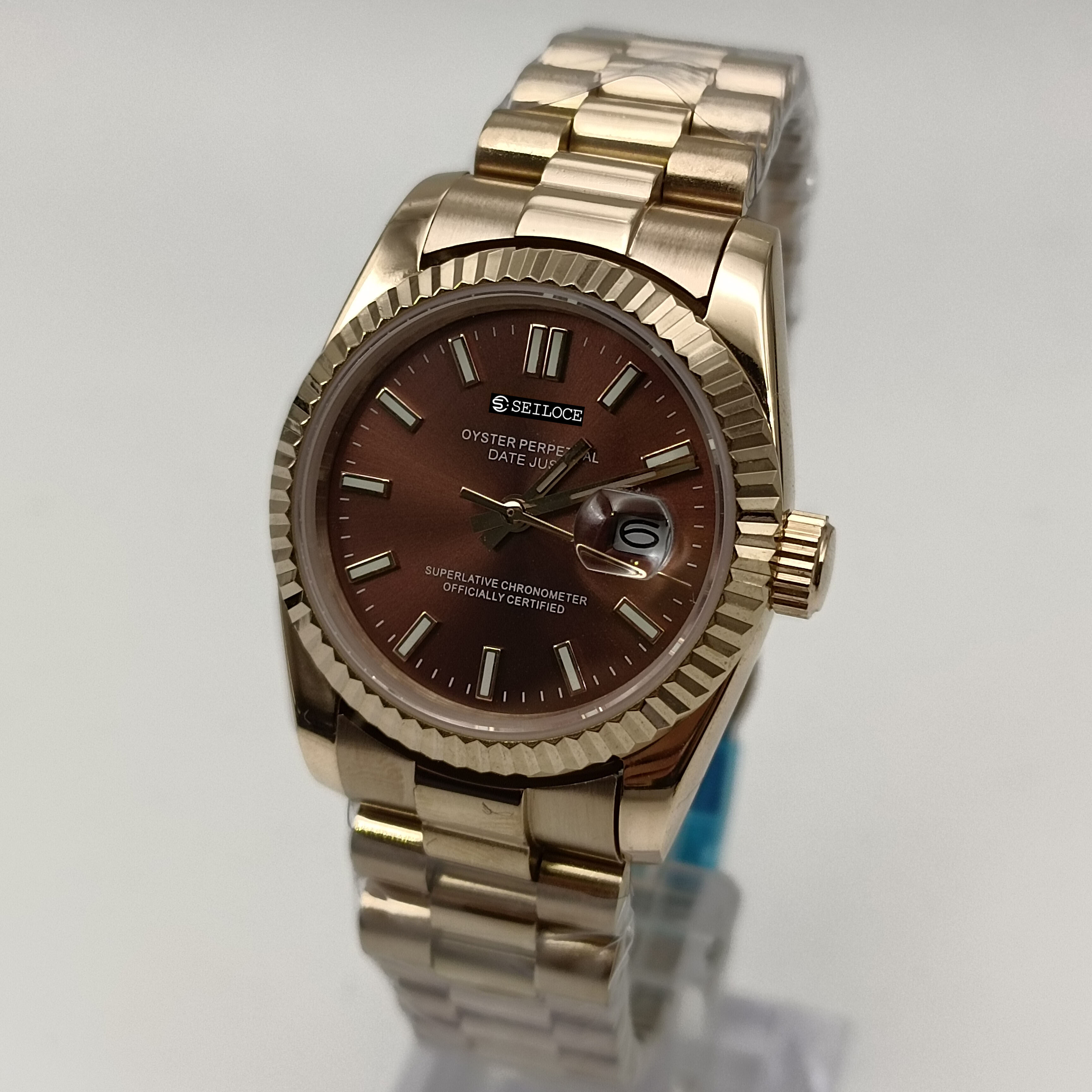 Boîtier en or rose + cadran marron