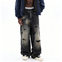 Jean large noir délavé et déchiré pour homme – Tendance et stylé avec patchwork – Coupe droite longue