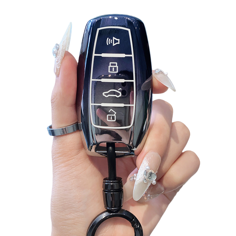 4 boutons noir + porte-clés