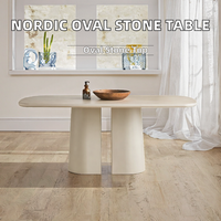 Nordischer Moderner Ovaler Steintisch mit Mikrozement-Platte und Massivholz-Eschenbasis im Minimalistischen Design für Kleine Wohnungen/Restaurants/Hotels