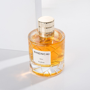 Fragancia <span class=keywords><strong>Vintage</strong></span> Elegante, Botella de Perfume de Vidrio Transparente Vacía de 50 ml y 100 ml, con Forma Cilíndrica y Grabado Geométrico, con Tapa Dorada - Product Image 1