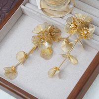 Boucles d'oreilles pendantes longues à motif queue de poisson cascade pour femme, avec aiguille en argent, design audacieux et accrocheur orné de fleurs et de diamants