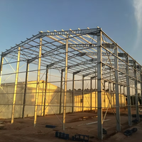 Entrepôt commercial moderne à structure métallique multi-étages en acier, construction professionnelle sur mesure