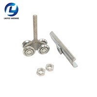 Rail de levage en acier inoxydable de conception moderne et ensemble complet de rouleaux de porte de roue pour porte coulissante