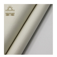 Tissu en cuir PVC PU gaufré imperméable RIGU à haute capacité de production annuelle, idéal pour les vestes en cuir confortables