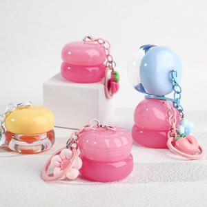 <span class=keywords><strong>Baume</strong></span> à lèvres hydratant végétalien de luxe saveur fruitée, format mini, <span class=keywords><strong>avec</strong></span> pot et porte-clés <span class=keywords><strong>fleur</strong></span>, idéal pour les soins de nuit des lèvres (Marque Blanche) - Product Image 2