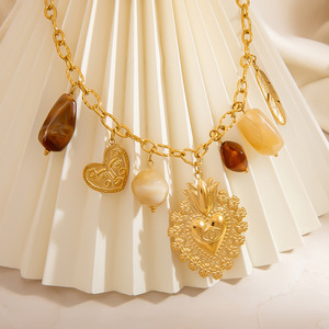 สร้อยคอสแตนเลส จี้รูปหัวใจ สีทอง โซ่คล้องไหปลาร้า จี้รูปขนนก เครื่องประดับแฟชั่น - Product Image 4