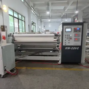 Machine de rembobinage de refendage d'étiquettes en tissu à lame chaude