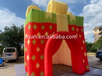 Boîte cadeau gonflable géante en forme de maison de Noël pour la publicité extérieure de Noël