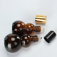 Bouteille à rouleaux en verre en forme de gourde unique pour huile essentielle de parfum 10ml 20ml 30ml 50ml 100ml emballage vide de cosmétiques en rouleau ambré