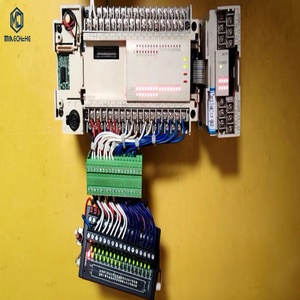 FX2N-48MR-001 PLC ตัวควบคุมลอจิกแบบตั้งโปรแกรมได้ โมดูลควบคุมอุตสาหกรรม ถอดประกอบแล้ว ทดสอบการทำงานของฟังก์ชันการเขียนโปรแกรมอย่างเต็มที่แล้ว - Product Image 1