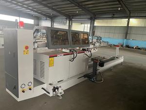 เครื่องเลื่อยสองด้านระบบ CNC แบบอัตโนมัติ HJN5A-450 * 3900 upvc อะลูมิเนียมกรอบหน้าต่างสามหัวเลื่อยใหม่มอเตอร์ PLC - Product Image 5