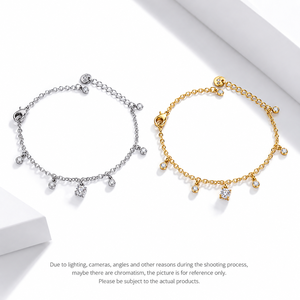 Dangling Cubic Zirconia <b>Charm</b> <b>Bracelet</b>, Stainless Steel Fine Chain with Round and Cluster Drops, Gold and <b>Silver</b>-Tone Options - Product Image 1