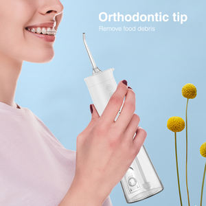 Dispositivo de limpieza de dientes eléctrico al por mayor sin cable IPX7 a prueba de agua para irrigador bucal hilo <span class=keywords><strong>dental</strong></span> para viajes en casa - Product Image 4