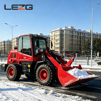 Chargeuse sur pneus compacte 4x4 de 2 tonnes de haute qualité avec lame à neige, engin à faible entretien pour les projets municipaux de déneigement hivernal