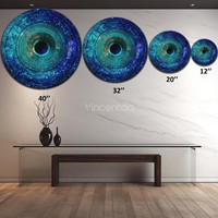 Grande sculpture murale ronde en métal Vincentaa, bleue, avec motif concentrique, pour la décoration du hall d'hôtel