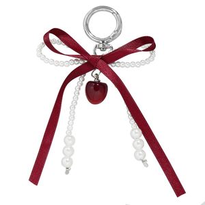 Nouveau Porte-clés et Pendentif de Sac 2025 avec Ruban Rouge Vin, Nœud en Perles d'Imitation et Petit Pendentif Cerise - Product Image 5