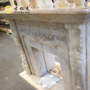 Chimenea francesa <span class=keywords><strong>de</strong></span> mármol envolvente con piedra <span class=keywords><strong>de</strong></span> ónix blanca moderna, repisa prefabricada para uso en sala <span class=keywords><strong>de</strong></span> estar interior, venta directa <span class=keywords><strong>de</strong></span> fabricación - Product Image 1