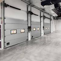 Porte sectionnelle isolée en acier pour entrepôt, porte de garage pour quai de chargement, centre logistique et applications industrielles