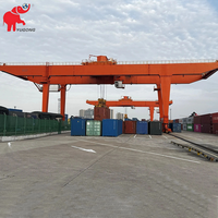 Grue portuaire à portique pour la manutention de conteneurs de 20, 40 et 45 pieds, et de conteneurs maritimes de 40, 45 et 40,5 tonnes, pour la zone de transport