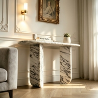 Table console contemporaine en marbre Bianco Carrara à pieds courbes, idéale pour les appartements modernes et minimalistes et les halls élégants