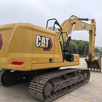 Excavatrice CAT 320GC professionnelle pour travaux lourds en carrière, 27,5T, équipée d'une pompe hydraulique et d'un roulement.