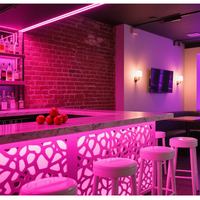 Comptoir de bar en pierre solide sur mesure avec éclairage LED translucide pour usage commercial en boîte de nuit