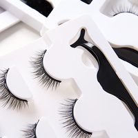 Fournisseur de gros OEM ODM ACCEPTÉ Cils en cheveux synthétiques moelleux de 25mm ensemble avec eyeliner et pince à épiler