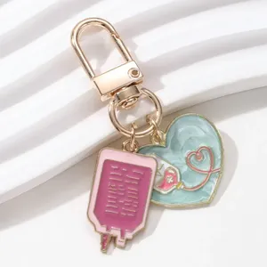 Porte-clés en forme de flacon de médicament en forme de cœur de dessin animé, série hôpital, pendentif mignon, cadeau idéal pour les médecins et les infirmières, bijoux faits à la main - Product Image 2