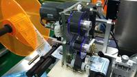 Machine d'impression semi-automatique, pour bouteilles plates