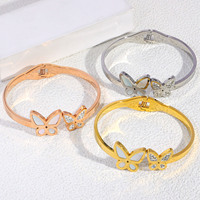 Bracelet manchette POWELL en acier inoxydable plaqué or 18 carats, hypoallergénique, avec fleurs émaillées et strass colorés, design artistique
