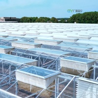Serre commerciale multi-travées de grande taille modèle GY10 de la marque GY, semi-fermée, avec structure en acier galvanisé à chaud et gouttière en aluminium néerlandaise