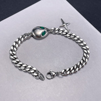 Mode personnalisé acier chaîne cubaine étoile croix yeux verts Alien charme Anti ternissement Bracelet unisexe