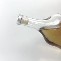 Bouteilles en verre personnalisées avec différentes capacités 500ml, poids 580 grammes et bouchons d'étanchéité (liège) et demande d'emballage