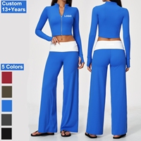 Nouvel arrivage : Ensemble de yoga 2 pièces pour femme avec veste à fermeture éclair dorée contrastante et pantalon taille haute à jambes larges, idéal pour le fitness, la course et les activités de plein air