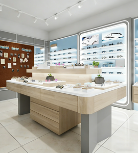 Magasin de vente au détail optique contemporain avec étagères ouvertes à niveaux et vitrines rondes éclairées - Product Image 3